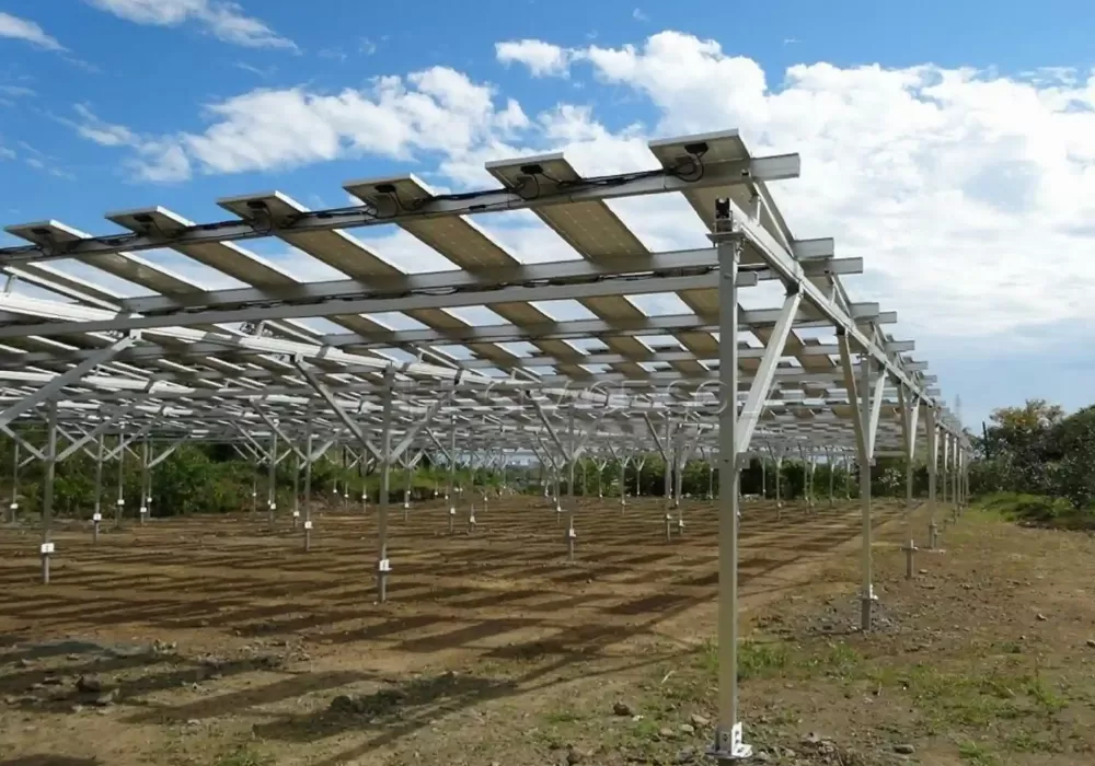High-capacity solar farm mounting infrastructure in agricultural field with precision-engineered support structures