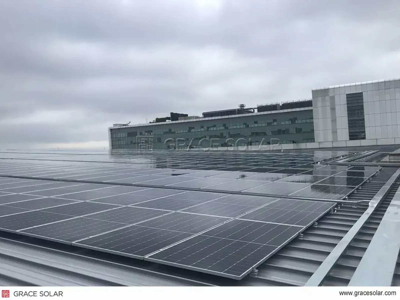 Close-Up: Elevated Mini Clamps on Corrugated Metal Roof - Grace Solar Installation