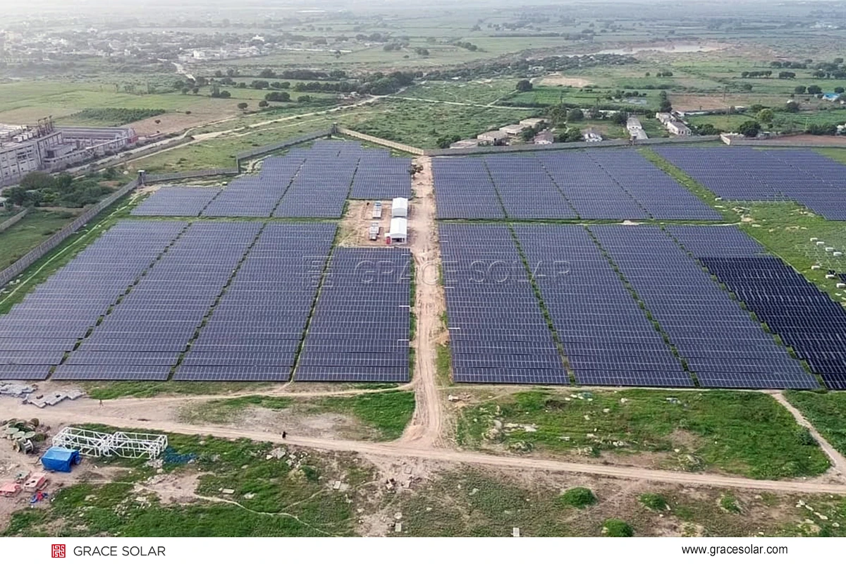 Aerial view of the completed 12MW solar power plant showing perfect alignment of solar arrays