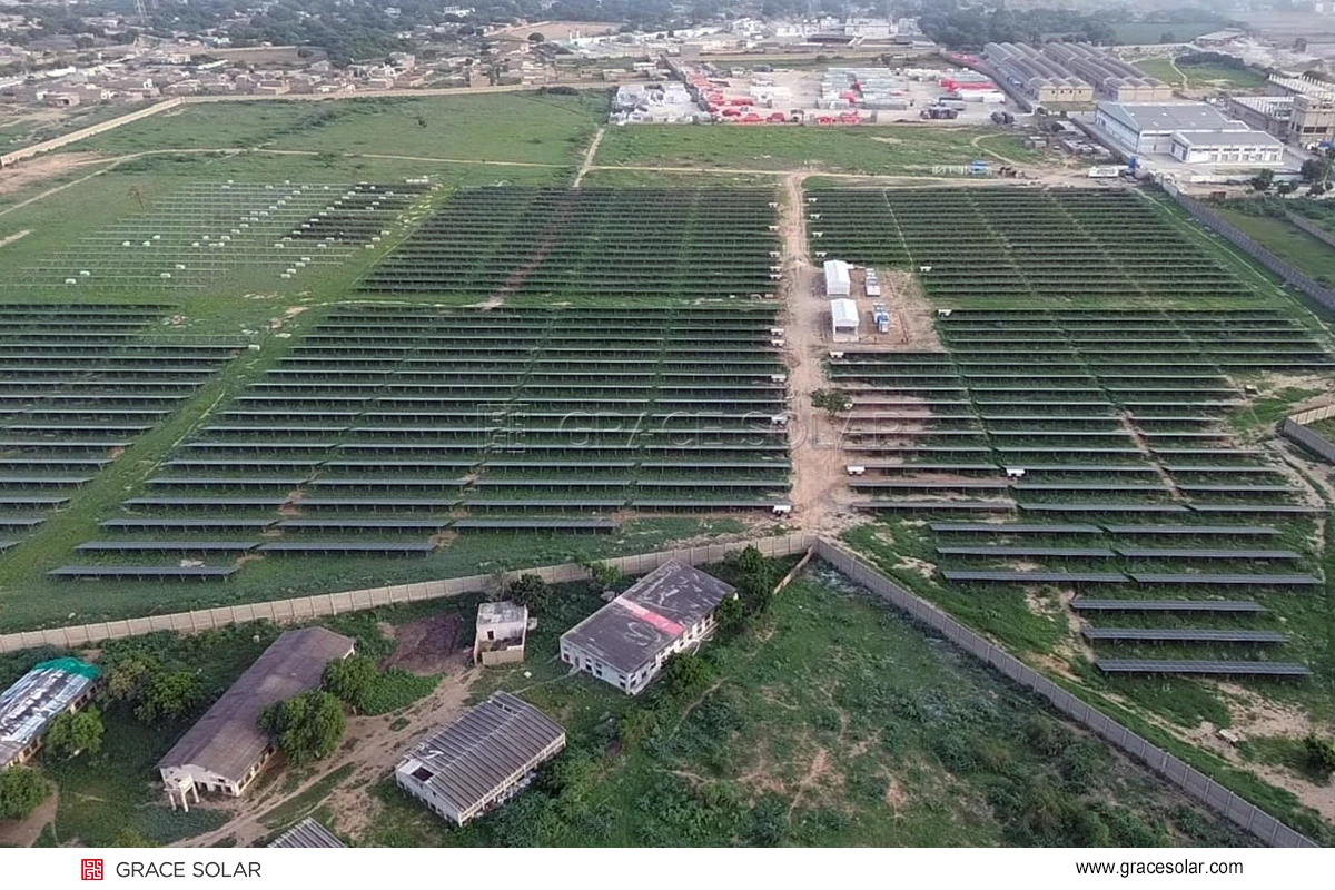 Grace Solar technical team conducting on-site measurements and adjustments during installation